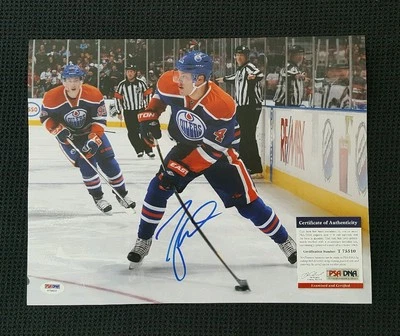 TAYLOR HALL Autographed Edmonton Oilers 11x14 Photo. PSA - Image 1 of 4