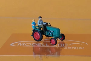 Busch 40072 Traktor Kramer KL 11 mit Bauer und Kind 1:87 NEU - Picture 1 of 2