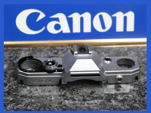 210751 CANON AE-1 TOP COVER CHROME REPAIR PART USED AE1 - Picture 1 of 3