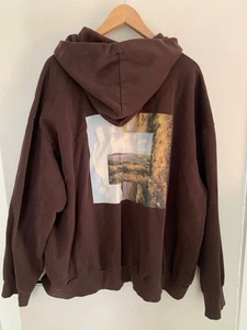 H&M Relaxed Fit Gr. XXL brauner Hoodie mit Grafikdesign im Querformat - Bild 1 von 7