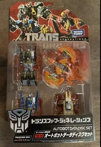 Takara Tomy Transformer Generation TG-15 Autobot Datadisc Set Prime Chug Go NEW - Picture 1 of 2