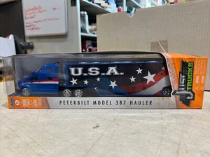 JADA JUST TRUCKS PETERBILT MODEL 387 HAULER U.S.A. FLAGS DIECAS TRUCK 14021 - Picture 1 of 8