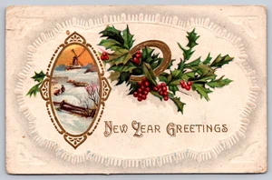 Postcard New Year Greetings Windmill Holly Horseshoe Embossed Snow Winter Oval - Picture 1 of 3