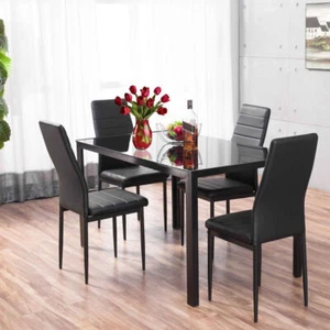 STUNNING GLASS BLACK DINING TABLE SET AND 4 FAUX LEATHER CHAIRS FOR HOME KITCHEN - Picture 1 of 19