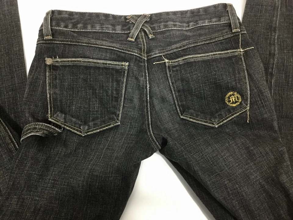 Pantalones de mezclilla elásticos ajustados negros desgastados Morphine Generation 26 para mujer Foto 1 de 4