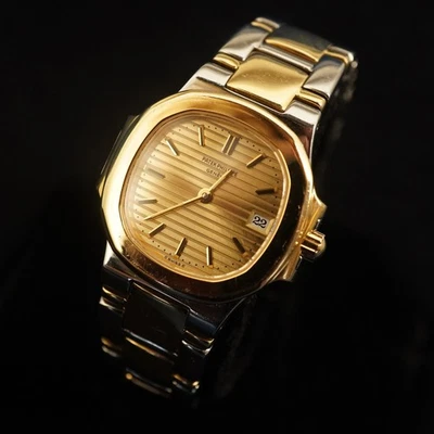 Reloj Mujer Patek Philippe Nautilus, Esfera Dorada, 27mm Ref. Pulsera 4700/051, 6" - Imagen 1 de 4