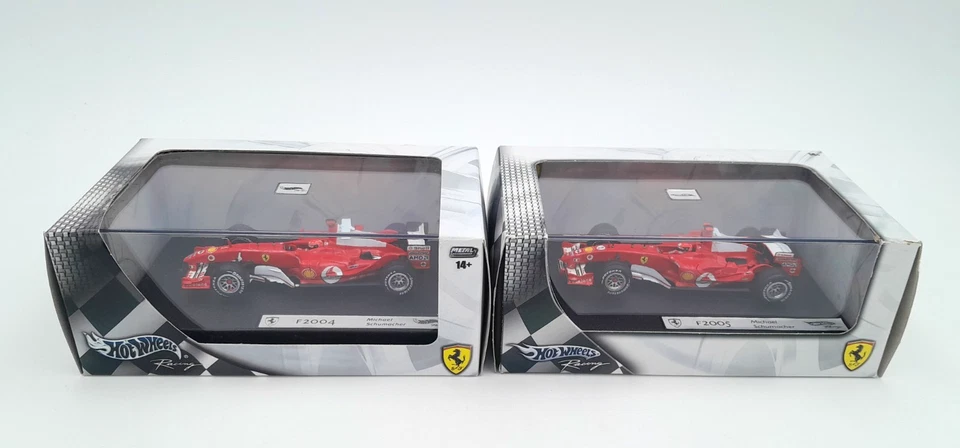 2 Hot Wheels Racing 1/43 Ferrari F2004 + F2005 MICHAEL SCHUMACHER  Mattel G9731 - Immagine 1 di 3