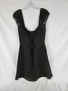 Reformation Damen Tupfen Schnür-Minikleid kurzärmelig schwarz/gold Größe 12 - Bild 1 von 6