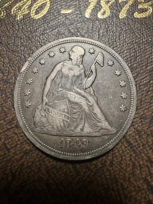 Moneda de un dólar libertad sentada de 1849 Foto 1 de 3