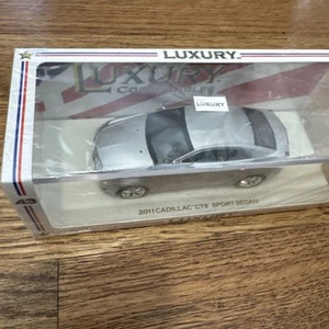 LUXURY COLLECTIBLES 1/43 CADILLAC 2011 CTS-V SEDAN CRYSTAL RED - Picture 1 of 11