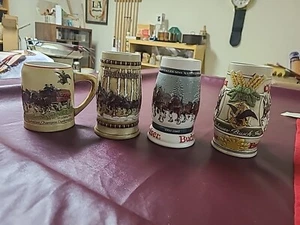 FIRST 4 ~ BUDWEISER HOLIDAY STEINS CS19 1980, CS50 1981, CS.  1982 & CS.  1983 - Bild 1 von 11