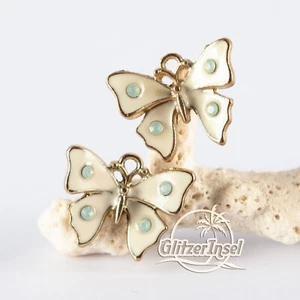 2x Schmuck Anhänger Schmetterling Creme Emaille Strass 16mm GlitzerInsel 00863f - Bild 1 von 2
