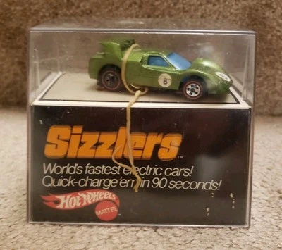 1969 Sizzlers 6501 Angelino M70 RedlineIn Cube Olive Color Hot Wheels Mattel - Image 1 of 4