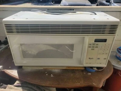 microondas hidromasaje sobre la estufa Foto 1 de 3