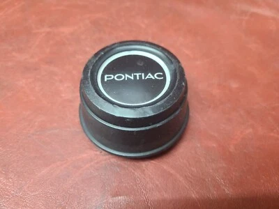 Pontiac Fiero 1984 1985 tapacubos central 1369 1005310 negro Foto 1 de 4