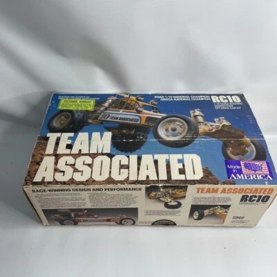 Team Associated RC10 A-Stamp 1ª Generación Encendedor Edinger Rodillo Dorado Manuales y Más Foto 1 de 4