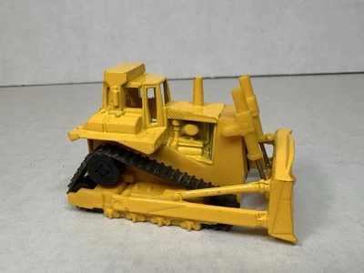 Hot Wheels CAT Bulldozer "Workhorses" 1979 Malaysia Base NICE - Image 1 of 4