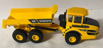 Camión de volteo Burago 7,5" largo escala 1/53 Volvo A25G camión articulado roca grava Foto 1 de 4