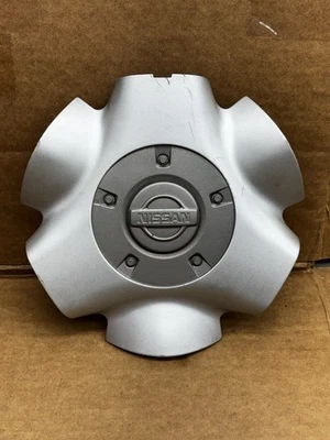 Tapa central de rueda Nissan Pathfinder 1999-2002 40342-2W600 #2 Foto 1 de 4