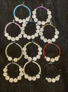 11 piezas Colección de dijes de vino inspirados en eras de Taylor Swift Vidrio con cuentas a mano plateado - Imagen 1 de 3