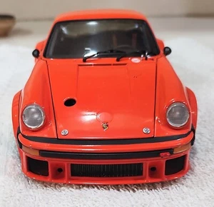 Exoto Racing Legends 1976 Porsche 934 RSR Client - Private Team orange Maßstab 1:18 - Bild 1 von 11
