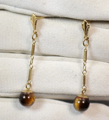 Preciosos aretes colgantes ojo de tigre de oro amarillo de 14K Foto 1 de 4