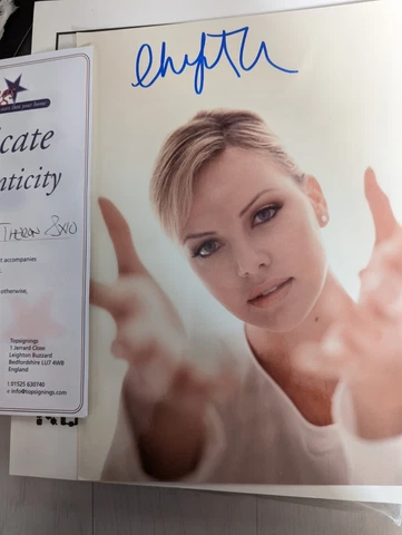 Charlize Theron 10 X 8 hand signed photo Cover