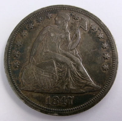 Dólar de plata libertad sentada 1847 Foto 1 de 4