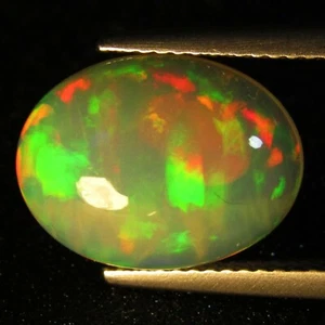 4.24Cts Stunning Natural Color Play White Opal 14.3x10.7x6mm Oval Gemstone - Picture 1 of 5