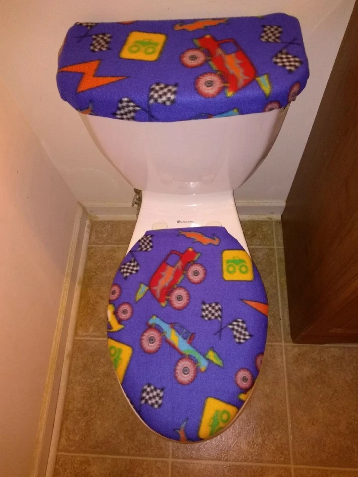 Juego de tapa de inodoro y tapa sin mangas de vellón Monster Trucks  Foto 1 de 1