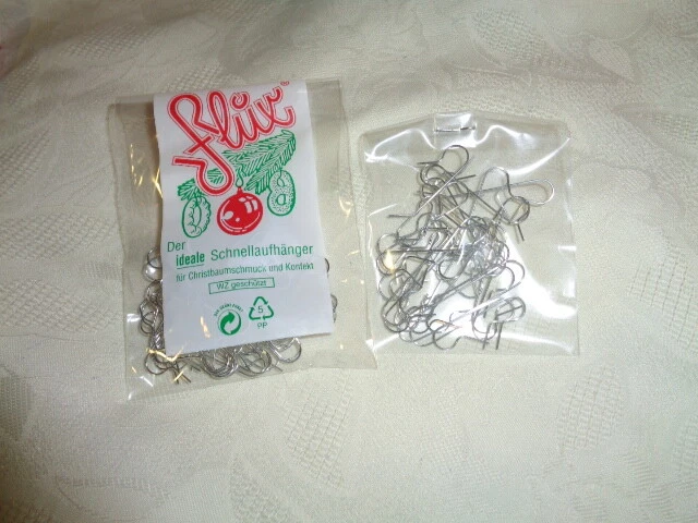 Aufhänger FLUX Gold Im Beutel - Riffelmacher Weinberger