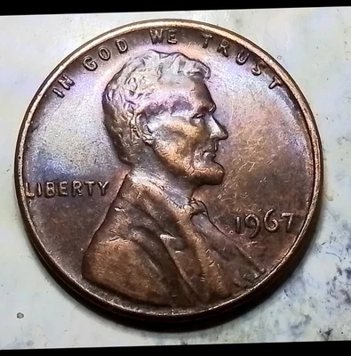 (Oct25) 1967 Error Die Chip On The Reverse On The E In Cent - Image 1 of 3