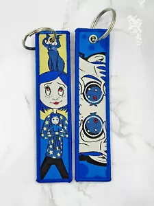 Llavero con etiqueta de doble cara con botón de coralina película de terror azul bordado con etiqueta de llave - Imagen 1 de 3