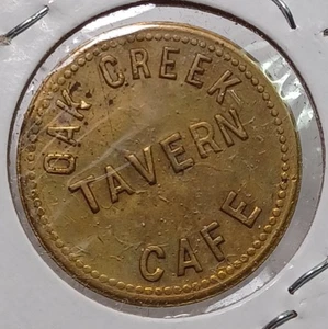 Colorado, Oak Creek Tavern Cafe Brass Round 10 Cent Token 22mm JRT 94 - Picture 1 of 2