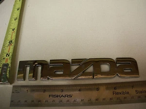 MAZDA SCRIPT EMBLEM SYMBOL USED BAGDE CHROME OEM ORIGINAL - Imagen 1 de 1
