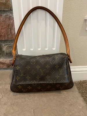 Bolsa Hobo Louis Vuitton aposentada mini couro marrom - Imagem 1 de 4