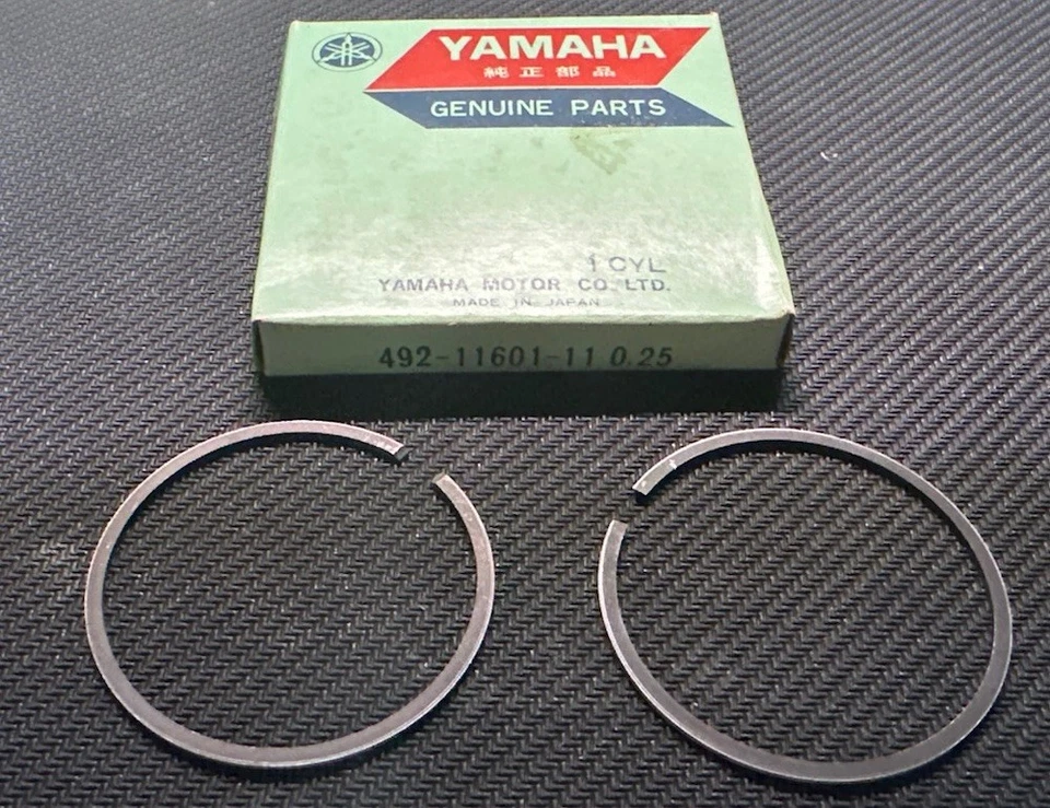 Juego de anillos de pistón OEM NUEVO +.25, 1er sobre 1975 Yamaha YZ80, 492-11601-11 Foto 1 de 1
