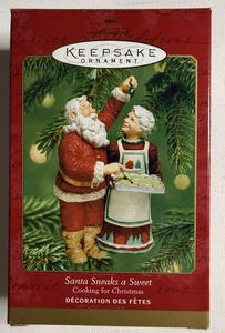 HALLMARK KEEPSAKE 2001 SANTA SNEAKS A SWEET CHRISTMAS ORNAMENT - Picture 1 of 4