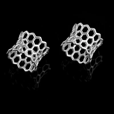 Tapones para los oídos de plata de nido de abeja medidores de plata de ley tapones de doble destello Foto 1 de 4