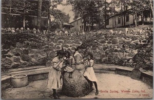 c1910s WINONA LAKE, Indiana Postcard "GROTTO SPRING" Girls at Water Fountain - Picture 1 of 2