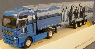 CONRAD,MAN TGA XXL 4x2 with 3 Axles trailer 2011 WEIHNACHTSMODELL, 1/50, CON6... - Image 1 of 2