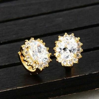 Bonitos aretes tipo argolla Huggie redondos ovalados blancos transparentes rellenos de oro amarillo con halo Foto 1 de 4