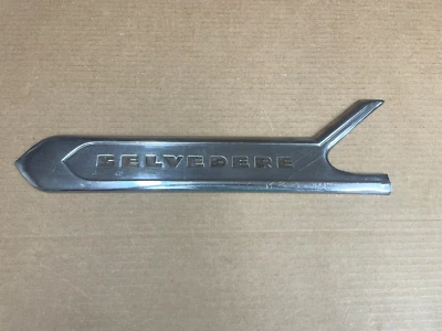 Plymouth Belvedere 1956 puerta izquierda centro moldura cromada fabricante de equipos originales usado Foto 1 de 4