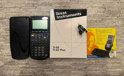 Texas Instruments TI-89 Graphing Calculator - with Cover, Manual, CD and Wire - Image 1 of 4