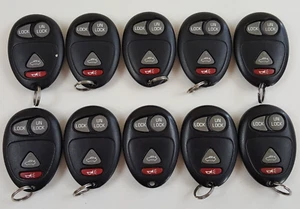 ORIGINAL LOT OF 10 GM 02-10 OEM KEY LESS ENTRY REMOTE DELPHI FOB GENUINE BULK US - Picture 1 of 12