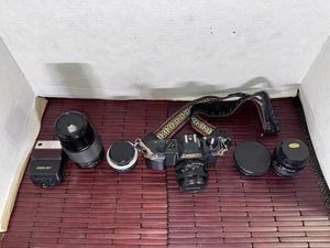Canon T50 analoge Spiegelreflexkamera 35 mm mit FD 35-70 mm Objektiv mit Tasche + mehr - Bild 1 von 21
