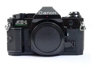 Cámara fotográfica Canon AE-1 Program 35 mm SLR cuerpo negro FD fotograma completo de Japón - Imagen 1 de 4