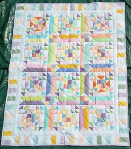 Handmade Patchwork Quilt with Pastel Colours. Quilt Measures 70.5in x 55.5in