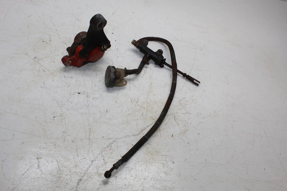 1982 SUZUKI GS550E REAR BACK BRAKE MASTER CYLINDER AND CALIPER  - Image 1 of 4