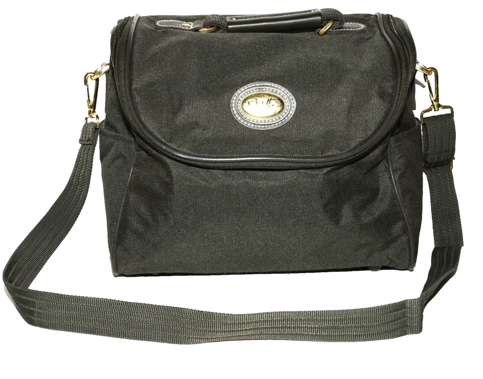 Bolso de mano Diane Von Furstenberg de lona verde oscuro con correa para el hombro fin de semana Foto 1 de 4